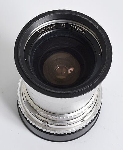 null Objectif chromé Hasselblad Carl Zeiss Distagon 50mm f/4 et son bouchon arrière

Bon...