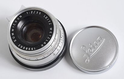 null Objectif argentique chromé Leitz Wetzlar Summicron 35mm f/2 + bouchon Leica

Très...