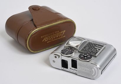 null Tessina Automatic 35mm compact silver camera with Tessina 25mm f/2,8 lens

with...