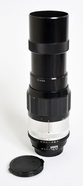 null Nikon (film) Tele Nikkor-Q Auto Ai 200mm f/4 and 2 caps

Good condition, fu...
