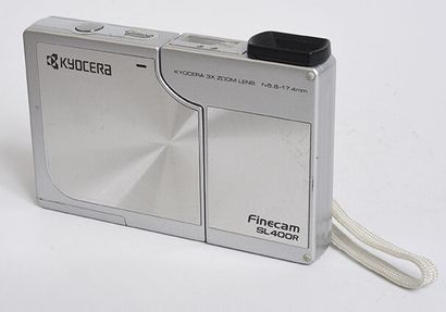 null Kyocera SL 400R digital camera with Kyocera 3x zoom lens 17,4mm f/ 5,8

with...