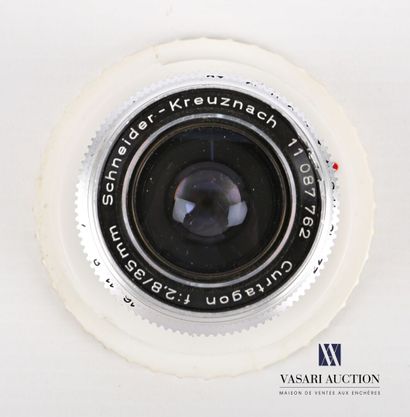 null Schneider Kreuznach Curtagon 35mm f/2,8 lens for ? camera, with its rear cap

Good...