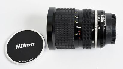 null Nikon (film) zoom lens Nikkor Ai 35-70 f/3,5 + leather case and 2 caps

Very...