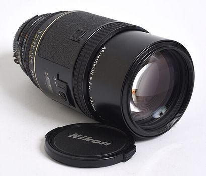 null Nikon Tele AF Nikkor ED 200mm f/3.5 lens and 2 caps

Average condition, mold...