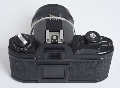 null Nikon EM film camera + Nikkor Ai 50mm f/1,8 lens + lens hood

Good condition,...