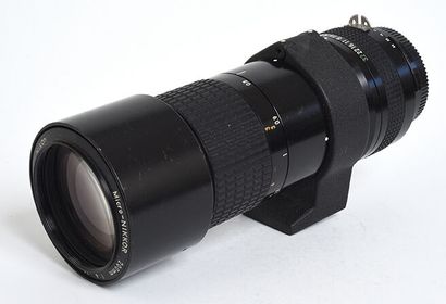 null Objectif macro Nikon (argentique) Télé Micro Nikkor Ai 200mm f/4 et 1 bouchon

Etat...