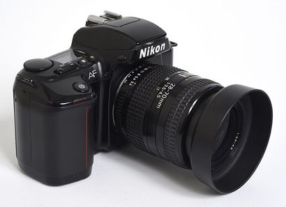 null Nikon F-601 AF film camera + Nikkor AF 28-70 f/3.5-4.5 lens + lens hood

Good...