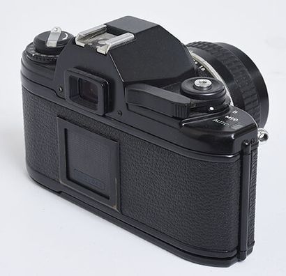 null Nikon EM film camera + Nikkor Ai 50mm f/1,8 lens + lens hood

Good condition,...