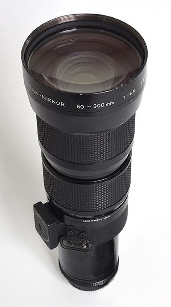 null Objectif Nikon (argentique) Télé Zoom Nikkor Ai 50-300mm f/4,5 et 1 bouchon

Bon...