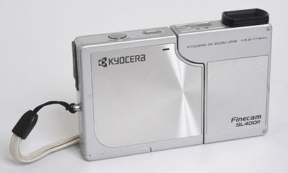 null Kyocera SL 400R digital camera with Kyocera 3x zoom lens 17,4mm f/ 5,8

with...