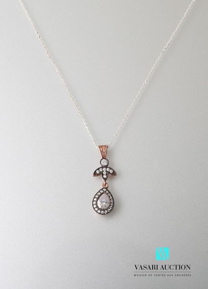 null Pendant in copper-plated silver of piriform form set with pear-cut zirconium...