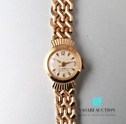 null Lady's watch in yellow gold 750 thousandths, the case of round form presents...