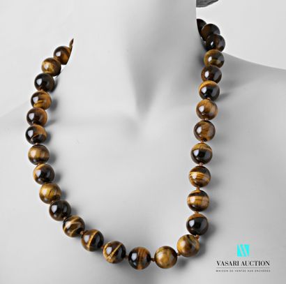 null Necklace in pearls of eye of tiger of 16,5 mm, the clasp snap hook out of steel.

Length...