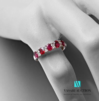 null Half wedding ring in white gold 750 thousandth set with five oval rubies alternated...