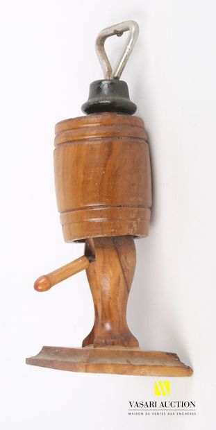 null Molded wood bottle opener decorated with a naked man hidden in a barrel, the...