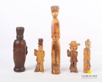 null Lot including four wooden carved shots featuring respectively a young boy, a...