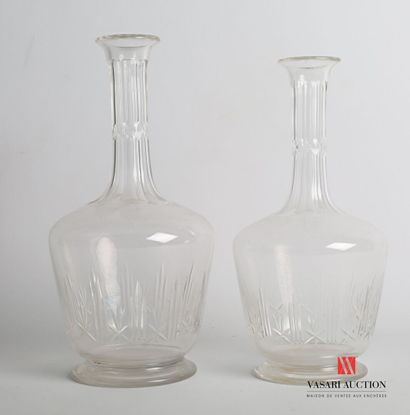 null Pair of glass carafes, the neck with cut sides and the body with decoration...