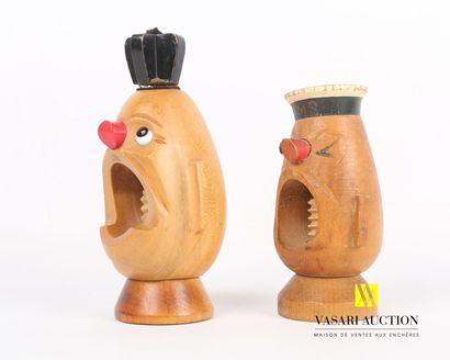 null Lot including two carved and partly painted wood nutcrackers representing a...