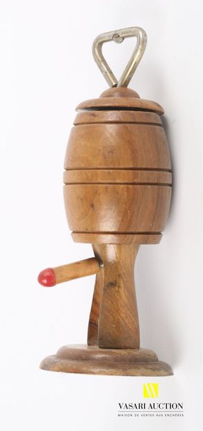 null Molded wooden bottle opener decorated with a naked man hidden in a barrel, the...