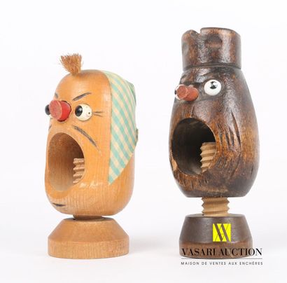 null Lot including two carved and partly painted wood nutcrackers representing a...