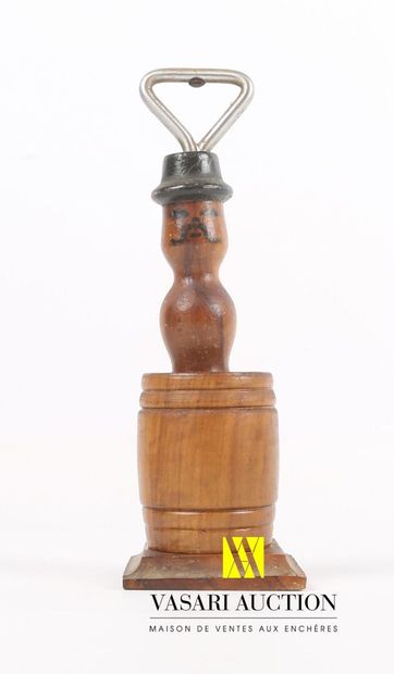 null Molded wood bottle opener decorated with a naked man hidden in a barrel, the...