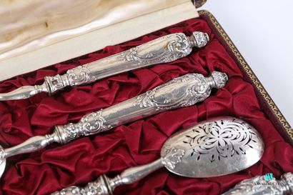 null Condiment set of four pieces in silver, the handles filled with scrolls, interlacing...