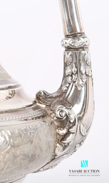 null A baluster-shaped silver coffee pot standing on a pedestal base, the body presents...