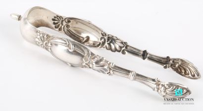 null Silver sugar tongs, the arms moved presents a reserve in mandorla figured in...