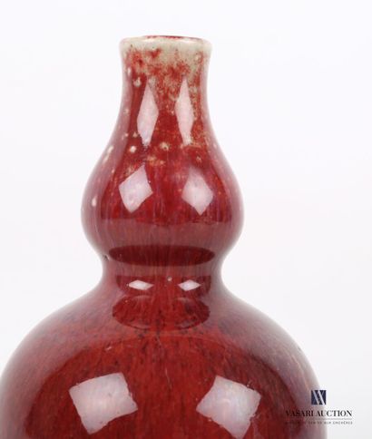 null CHINE

Vase de forme coloquinte en céramique à émail sang de boeuf 

XXème siècle

Haut....