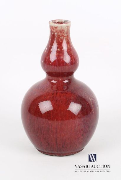 null CHINE

Vase de forme coloquinte en céramique à émail sang de boeuf 

XXème siècle

Haut....