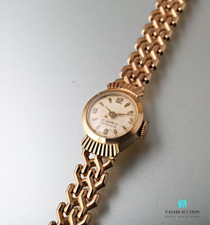 null Lady's watch in yellow gold 750 thousandths, the case of round form presents...