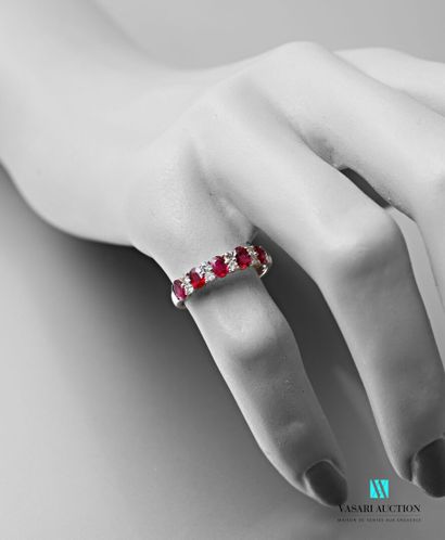 null Half wedding ring in white gold 750 thousandth set with five oval rubies alternated...