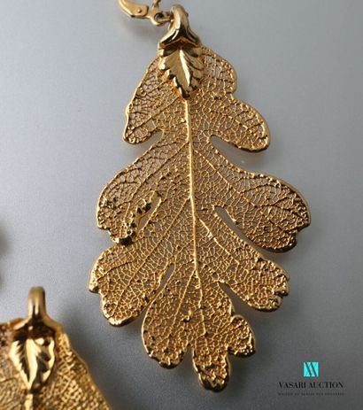 null Half set of gold plated oak leaves including: a brooch pendant and a pair of...