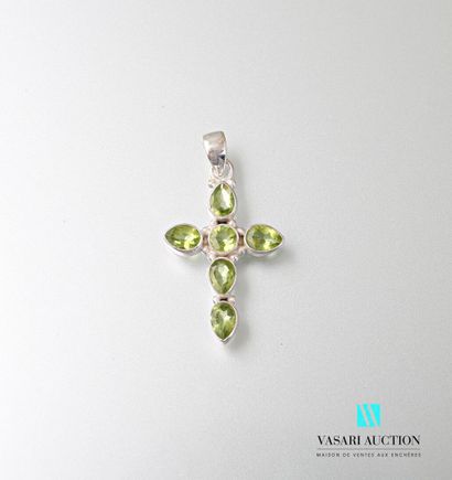 null Silver cross set with six peridot, the central one being round and the others...