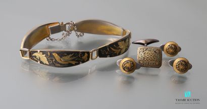 null A gold-plated bracelet with a niello decoration of birds, flowers and foliage,...