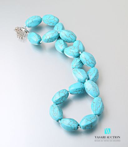null Turquoise blue howlite ribbed pearl necklace, metal clasp.

Length : 45 cm