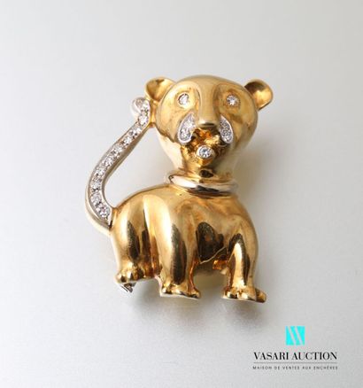 null Animal brooch in yellow and white gold 750 thousandths in the shape of lion...