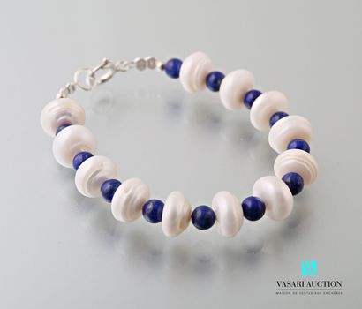 null Bracelet de perles blanches de forme rondelle alternées de billes de Lapis lazuli,...