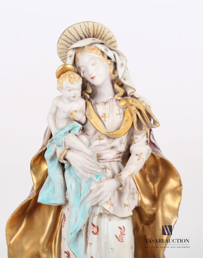 null Vierge à l'Enfant en porcelaine traité en polychromie et rehaut dorés 

Fabrication...