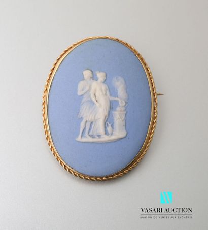 null Brooch in yellow gold 750 thousandths decorated with a cameo in blue and white...