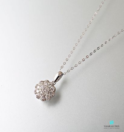 null White gold necklace set with a rosette of modern-cut round diamonds totaling...