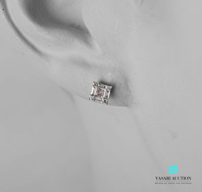null Pair of square earrings set with baguette and round diamonds, silicone clasps.

Gross...