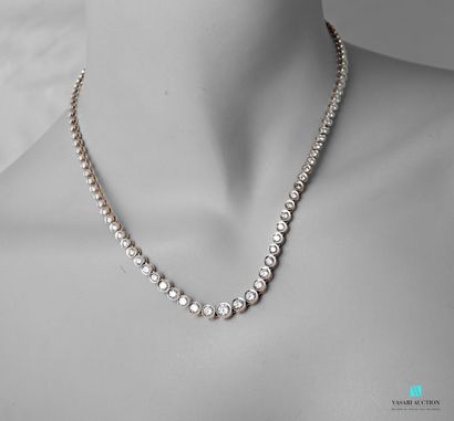 null Necklace river in white gold 750 thousandths decorated with 57 diamonds in closed...
