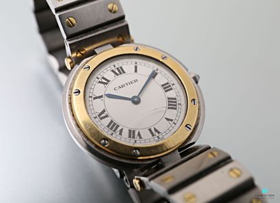 null Cartier, montre bracelet d'homme en acier et or, modèle Santos, boîtier rond,...