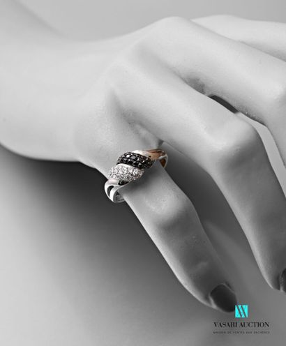null Ring in white gold 750 thousandths decorated with two twists set with black...