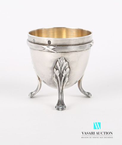 null Silver egg cup with a body hemmed with nets and crossed ribbons and resting...