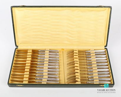 null Suite of twelve forks and twelve dessert knives, the handles in silver with...