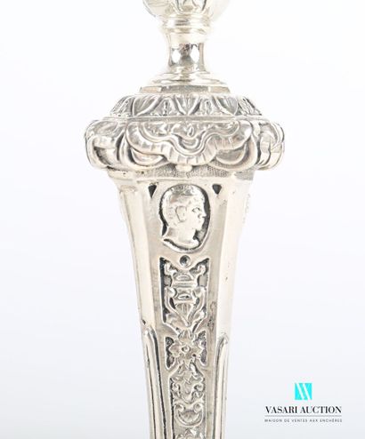 null Suite of four silver torches standing on an octagonal base hemmed with foliage...