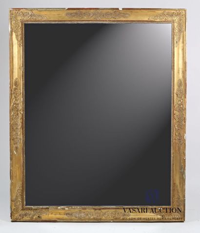 null Rectangular mirror in wood and stucco molded, carved and gilded, decorated with...