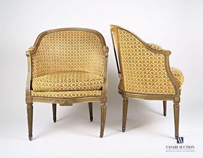 null Pair of bergères in molded wood, carved and lacquered green and gold, the basket...